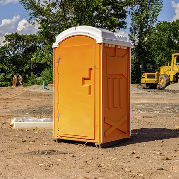 what is the cost difference between standard and deluxe portable restroom rentals in Kim